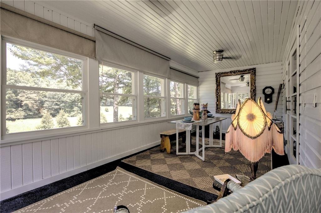 18131 Morganton Highway Morganton, GA 30560 - Photo 14 of 71 a living room with furniture a window and a table