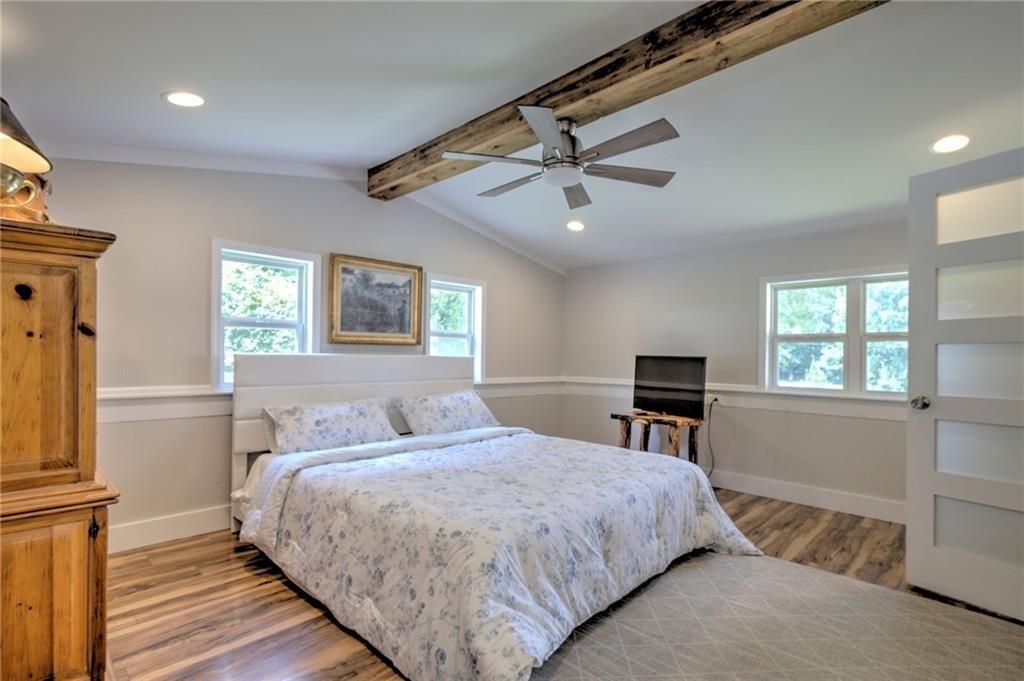 18131 Morganton Highway Morganton, GA 30560 - Photo 18 of 71 a bedroom with a bed dresser and a window
