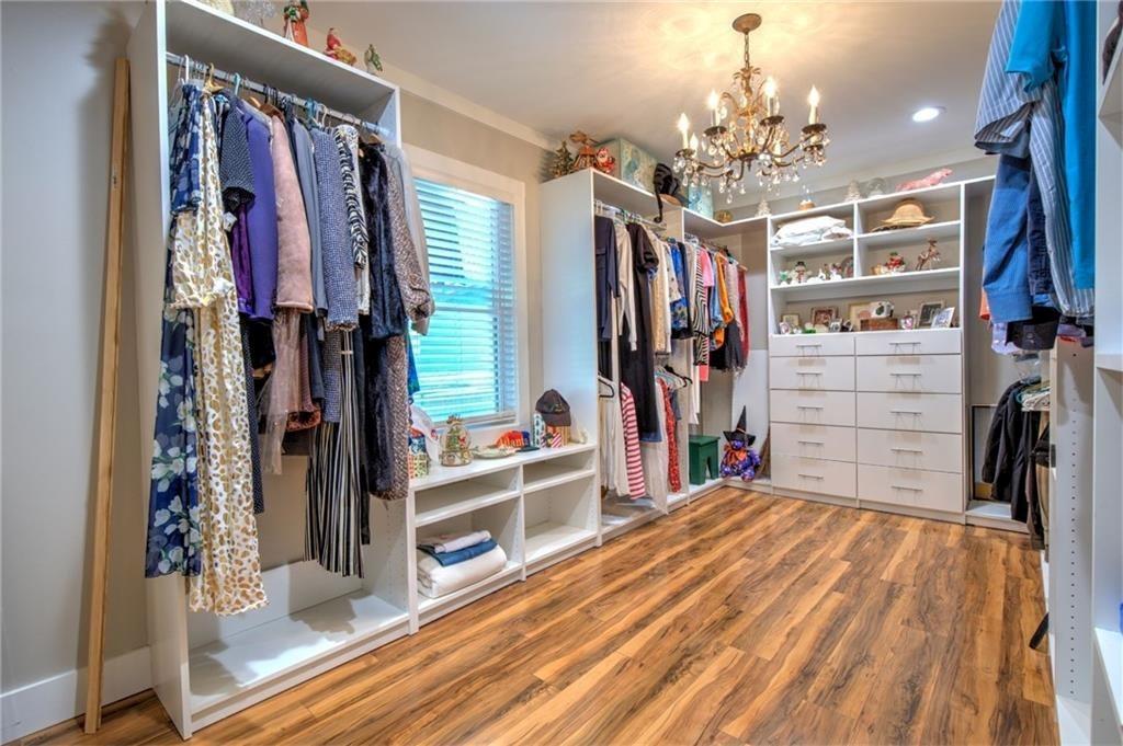 18131 Morganton Highway Morganton, GA 30560 - Photo 24 of 71 a very nice looking room with a large bed and a chandelier