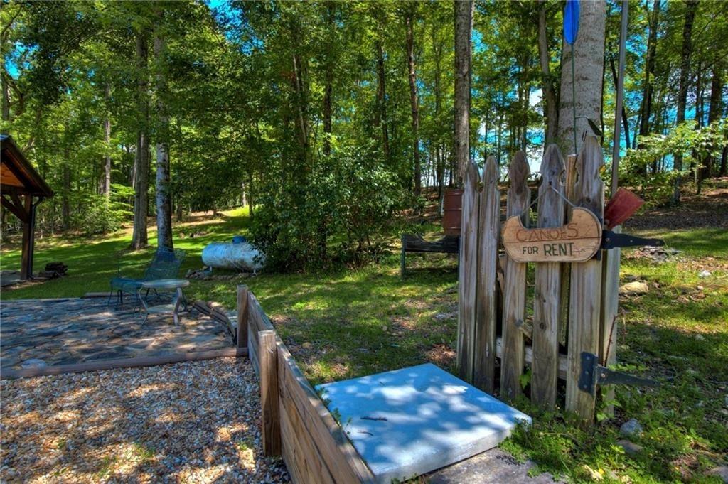 18131 Morganton Highway Morganton, GA 30560 - Photo 28 of 71 a view of a house with a yard garden and outdoor seating