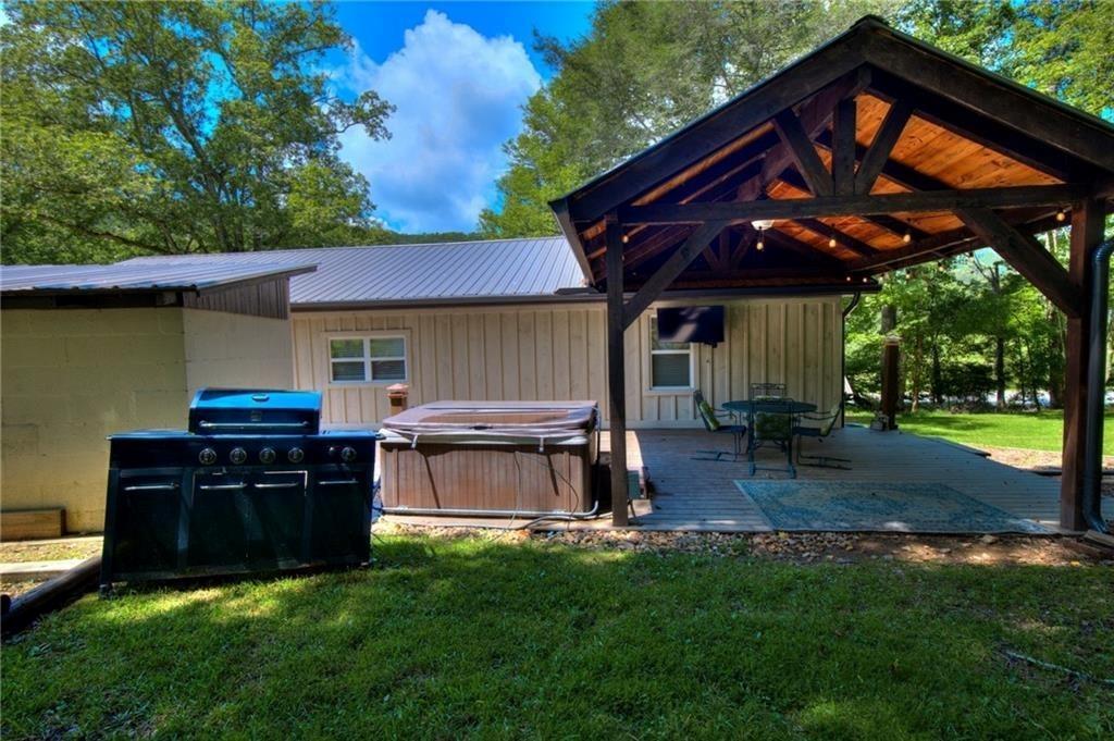 18131 Morganton Highway Morganton, GA 30560 - Photo 30 of 71 a view of a house with backyard and porch