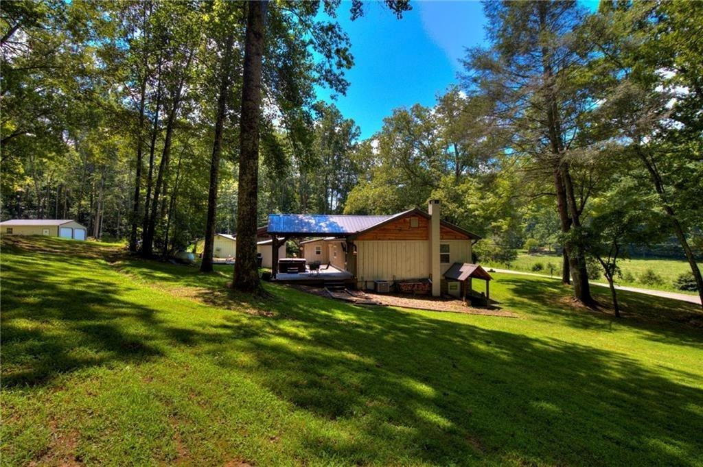 18131 Morganton Highway Morganton, GA 30560 - Photo 32 of 71 a view of a house with a yard