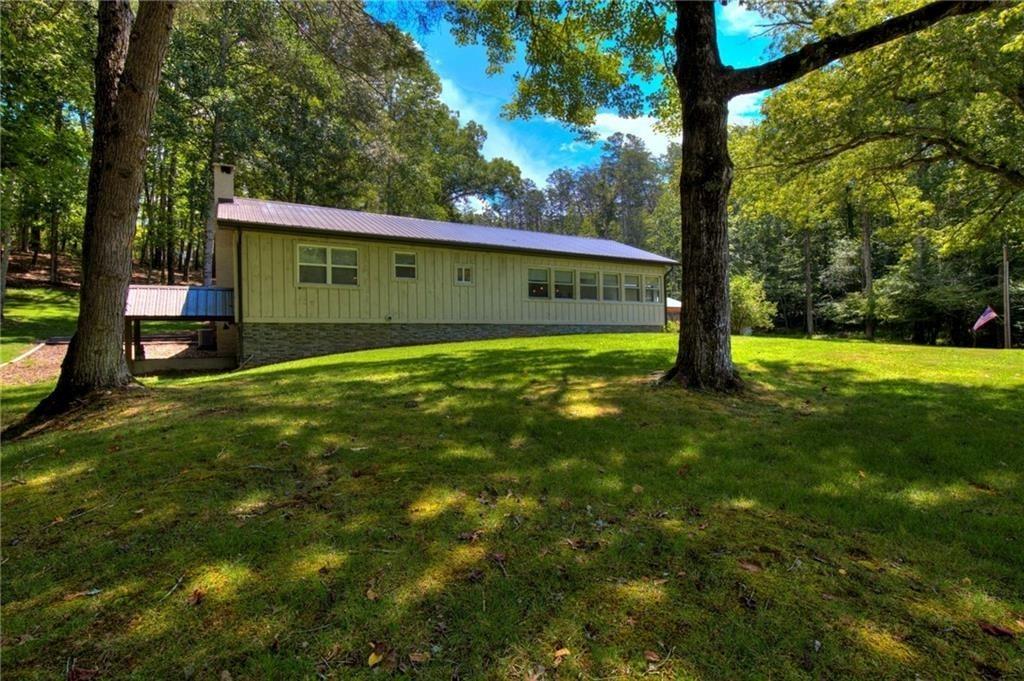 18131 Morganton Highway Morganton, GA 30560 - Photo 35 of 71 a view of a big yard with potted plants and large tree