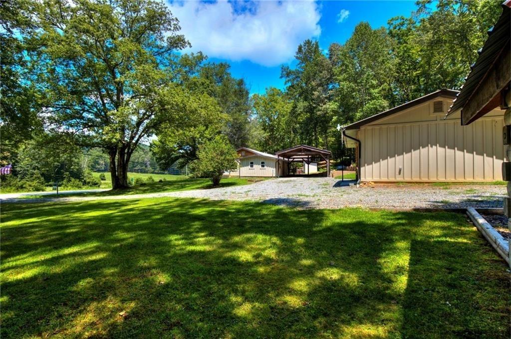 18131 Morganton Highway Morganton, GA 30560 - Photo 41 of 71 a view of backyard with swimming pool and sitting area