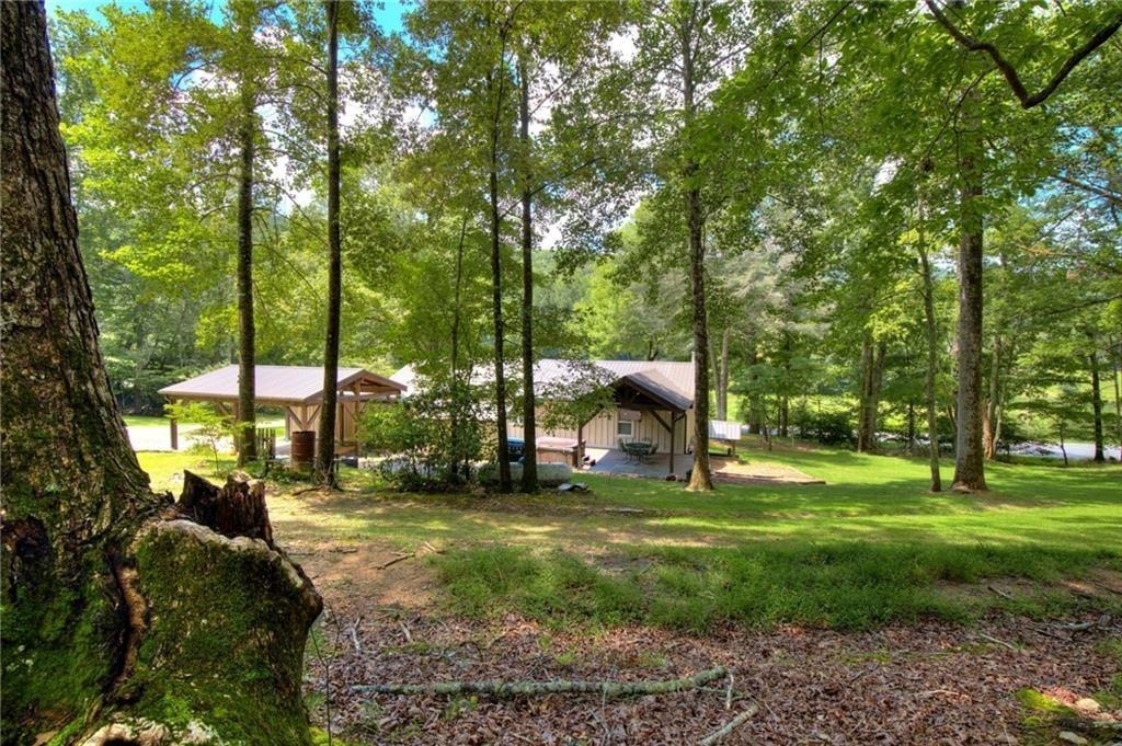 18131 Morganton Highway Morganton, GA 30560 - Photo 49 of 71 a backyard of a house with lots of green space