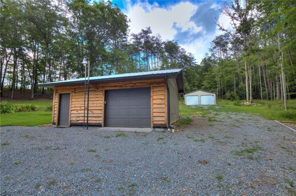 18131 Morganton Highway Morganton, GA 30560 - Photo 58 of 71 a view of a house with a backyard
