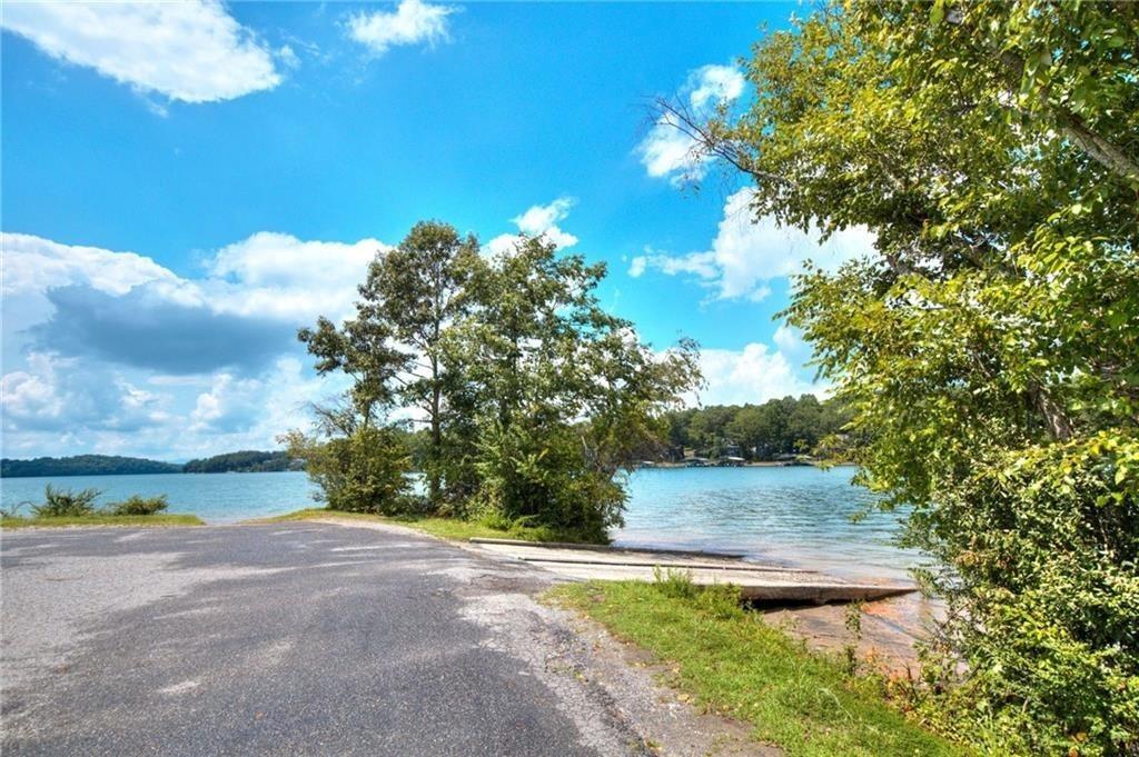 18131 Morganton Highway Morganton, GA 30560 - Photo 66 of 71 a view of a yard with an tree and a fence