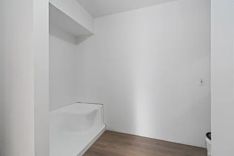 a view of an empty walk in closet