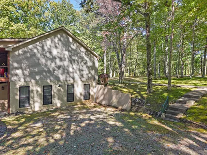 a view of street with large trees
