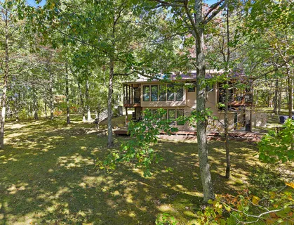 a view of yard with swimming pool