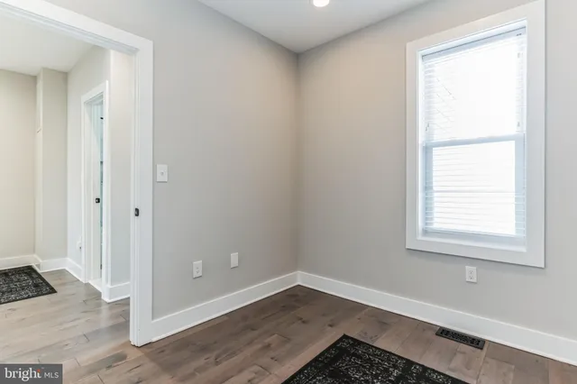 a view of a room that has a window in it