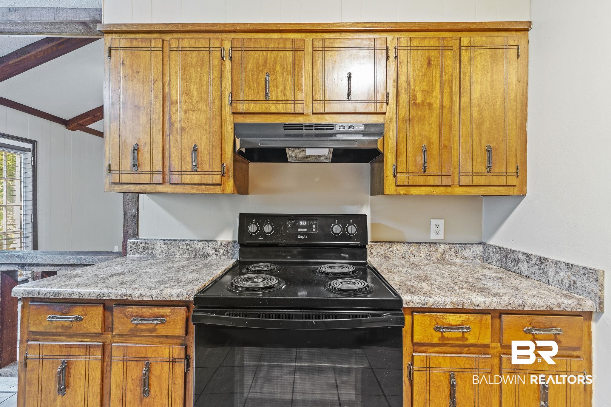 4151 Springdale Road Mobile, AL 36609 - Photo 16 of 21 Kitchen featuring ventilation hood, tile patterned flooring, light stone countertops, and electric range