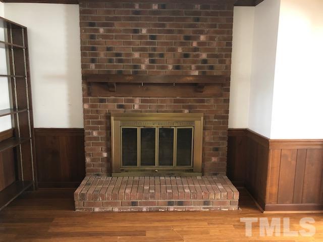 2804 Steeplechase Court Raleigh, NC 27613 - Photo 14 of 41 a view of fireplace and window