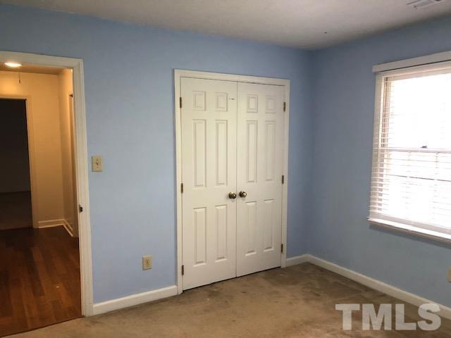 2804 Steeplechase Court Raleigh, NC 27613 - Photo 23 of 41 an empty room with window