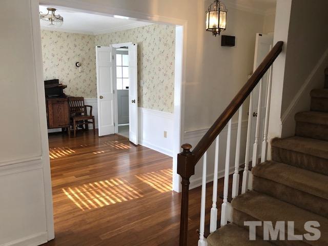 2804 Steeplechase Court Raleigh, NC 27613 - Photo 4 of 41 a view of entryway and hall with wooden floor