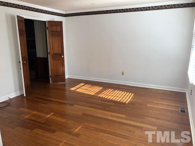 2804 Steeplechase Court Raleigh, NC 27613 - Photo 10 of 41 a view of walk in closet with clothes