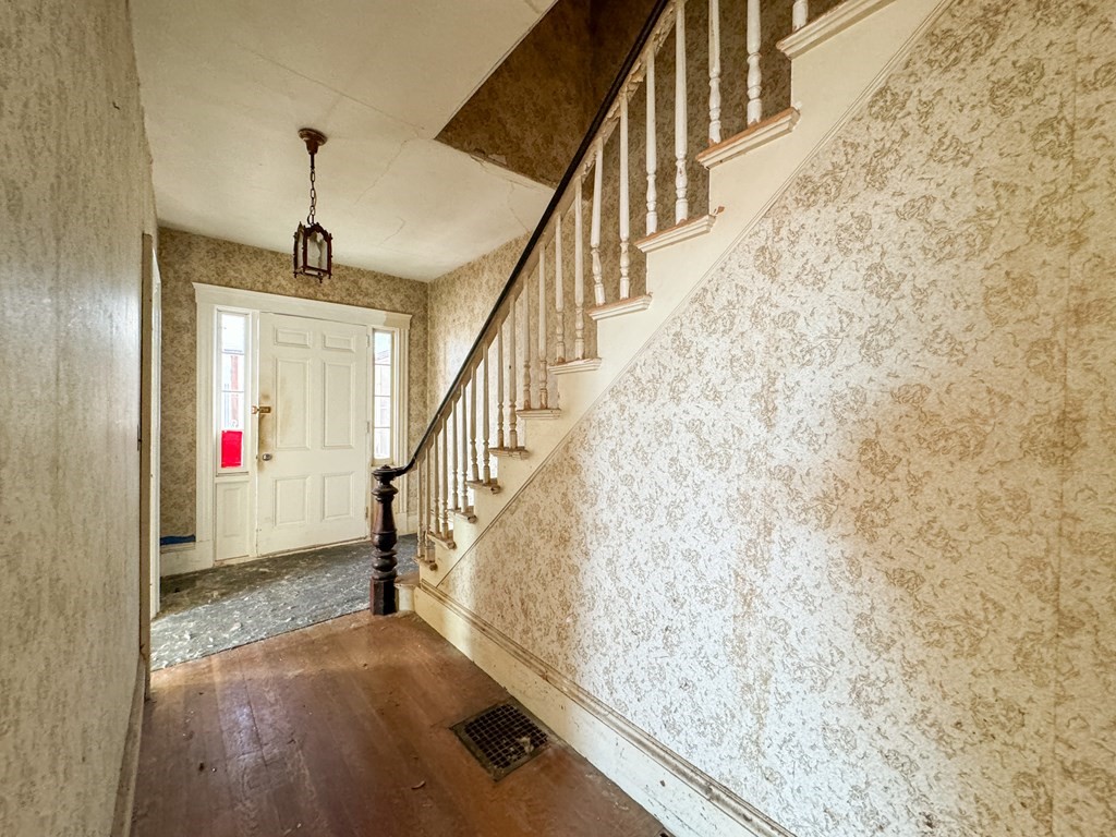 64 Braeburn Road Boston, MA 02136 - Photo 16 of 23 a view of entryway and hall with wooden floor