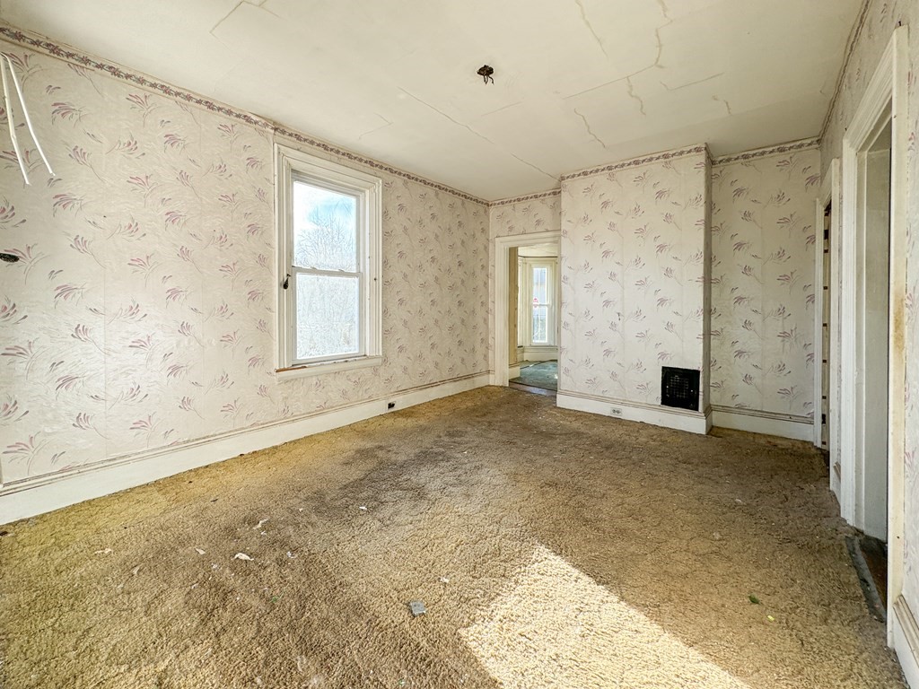 64 Braeburn Road Boston, MA 02136 - Photo 10 of 23 a view of an empty room with a window