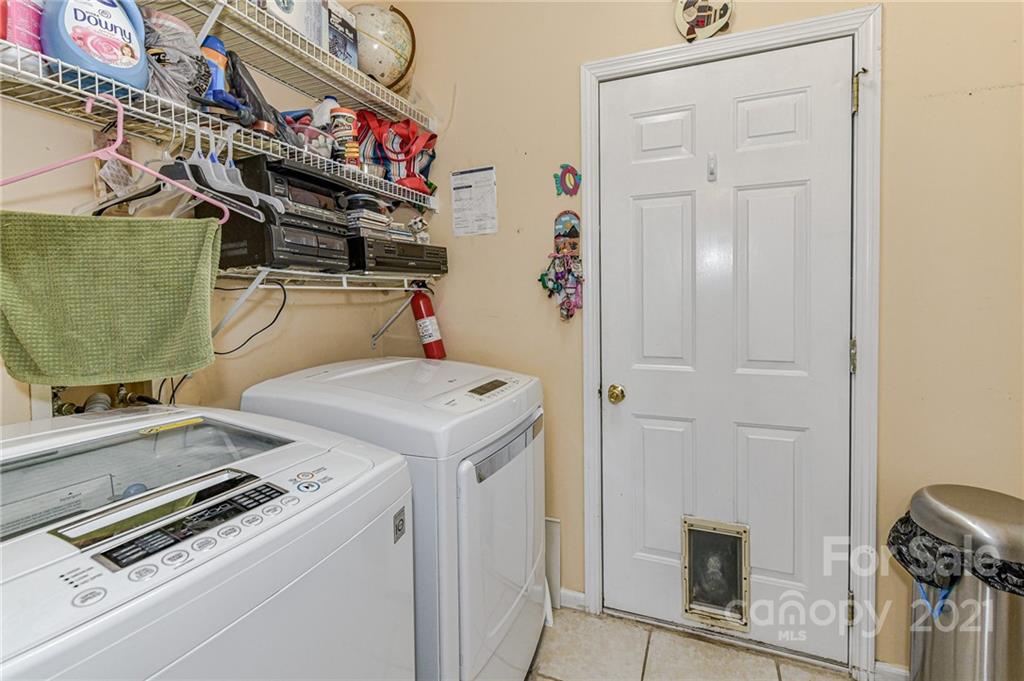 9043 Silver Coach Lane Charlotte, NC 28273 - Photo 17 of 32 a utility room with dryer and washer