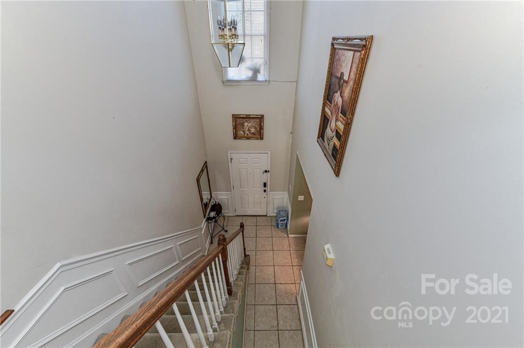 9043 Silver Coach Lane Charlotte, NC 28273 - Photo 18 of 32 a view of stairs