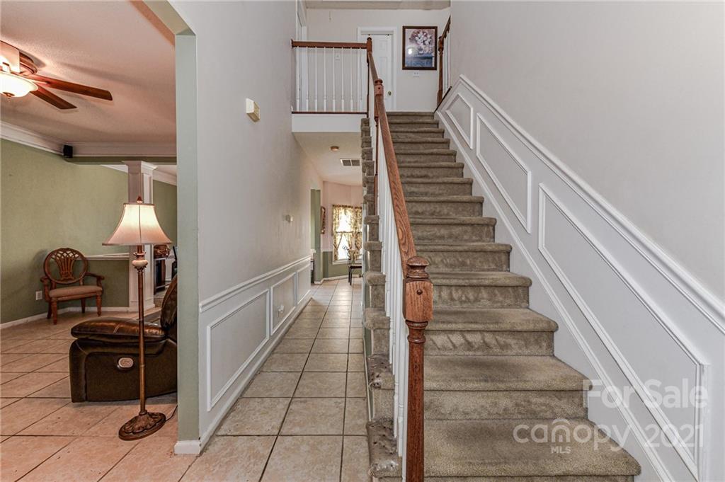 9043 Silver Coach Lane Charlotte, NC 28273 - Photo 5 of 32 a view of entryway and hall