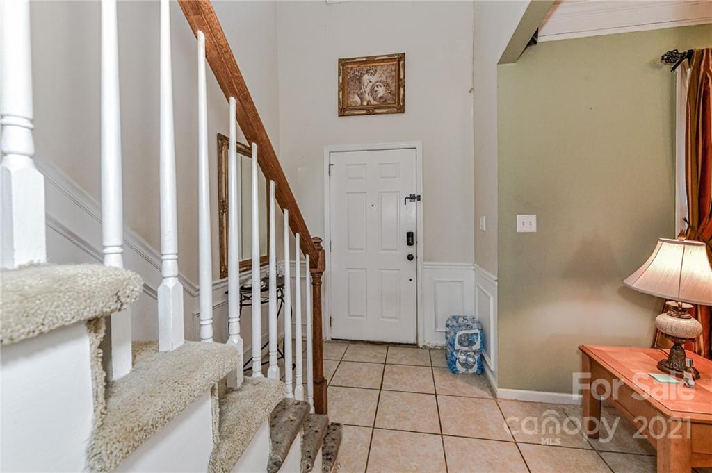9043 Silver Coach Lane Charlotte, NC 28273 - Photo 6 of 32 a view of an entryway and livingroom