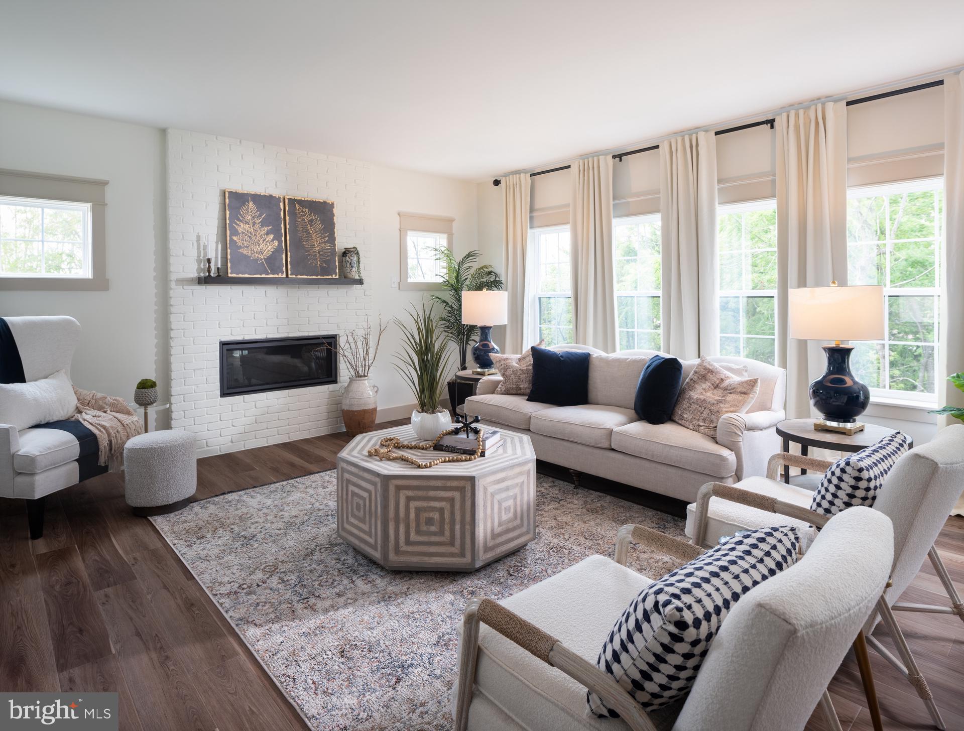 707007728 Hook Road, Unit COVINGTON Westminster, MD 21157 - Photo 21 of 48 a living room with furniture and a large window