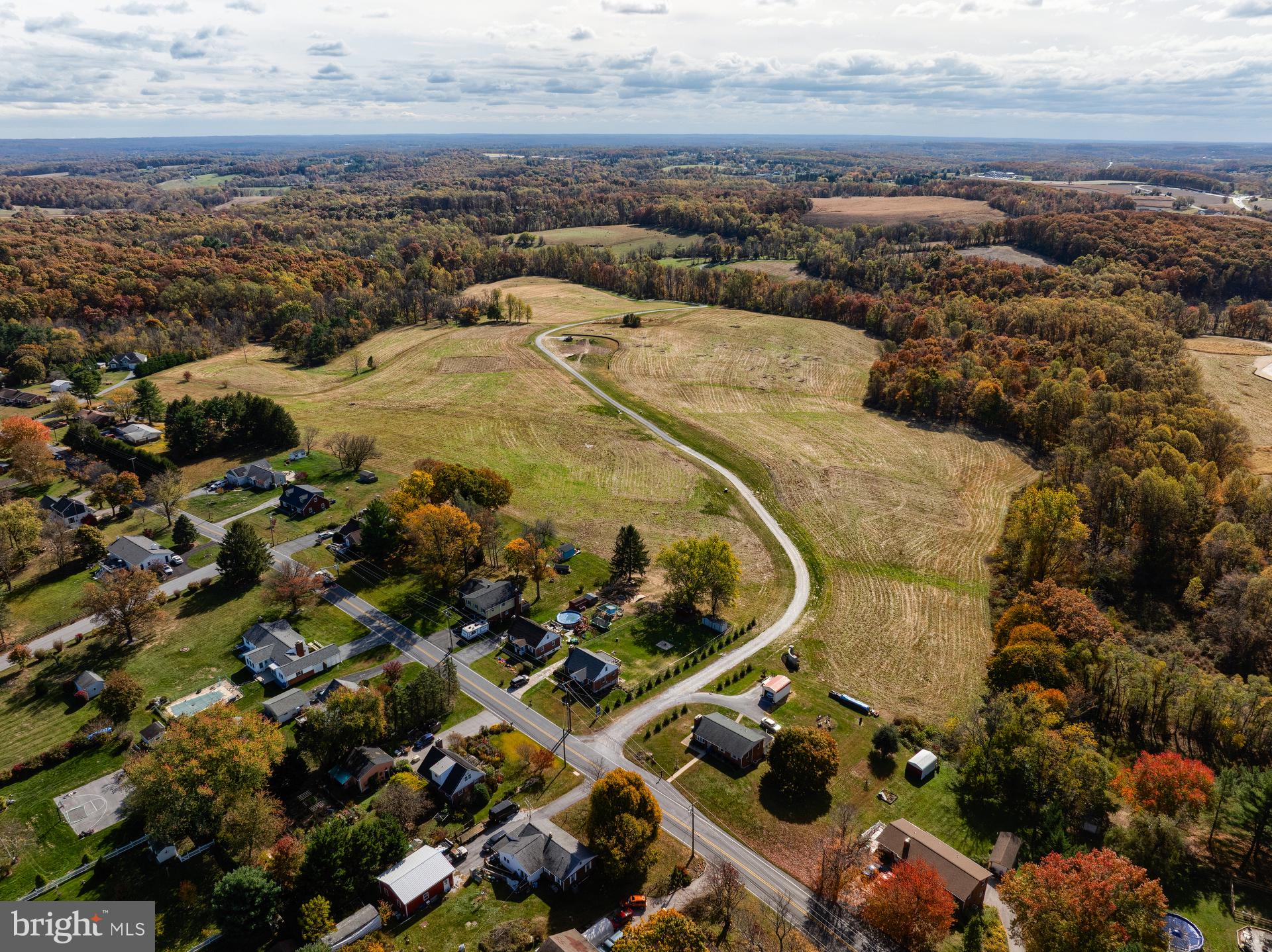 707007728 Hook Road, Unit COVINGTON Westminster, MD 21157 - Photo 45 of 48 an aerial view of residential houses with outdoor space