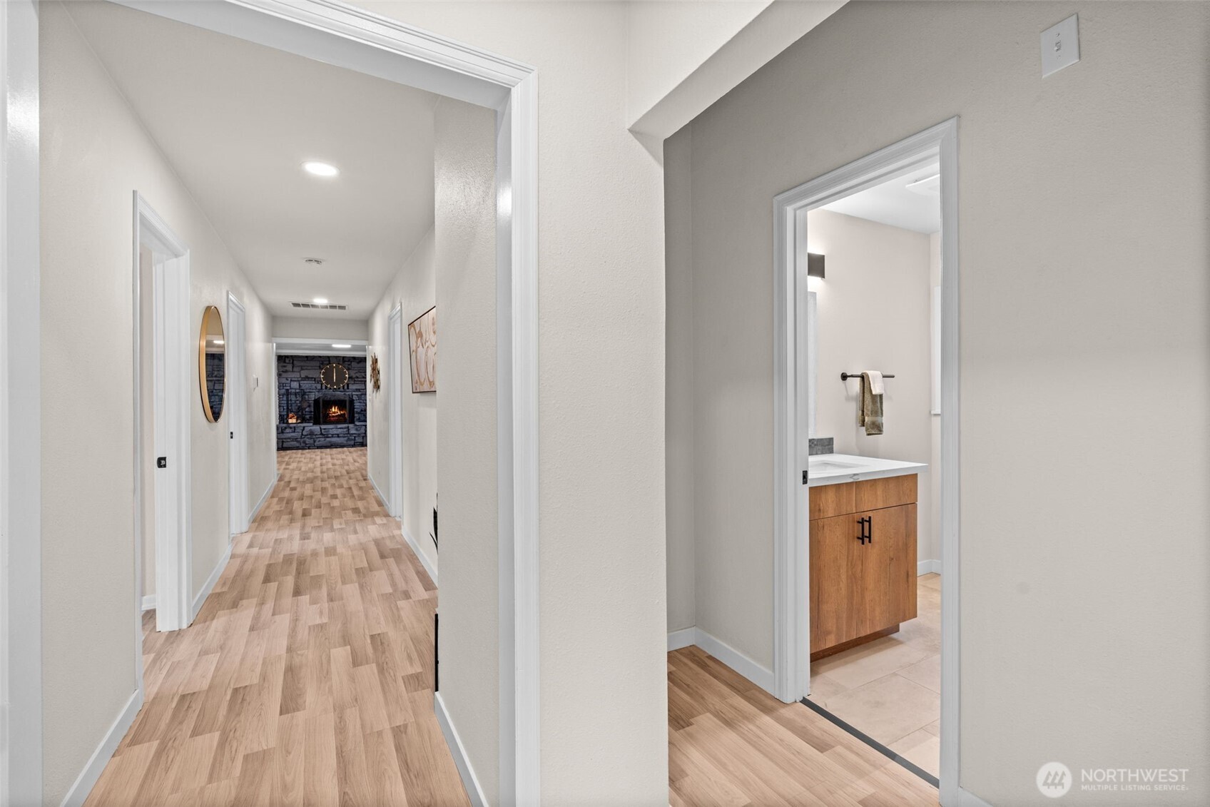 3215 North Tyler Street Tacoma, WA 98407 - Photo 12 of 40 a view of a hallway with wooden floor and staircase