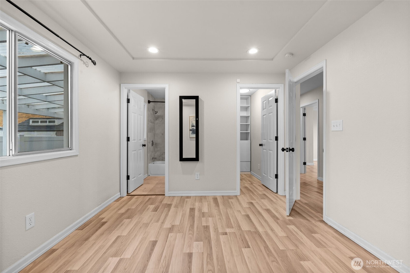 3215 North Tyler Street Tacoma, WA 98407 - Photo 14 of 40 a view of a room with wooden floor and window