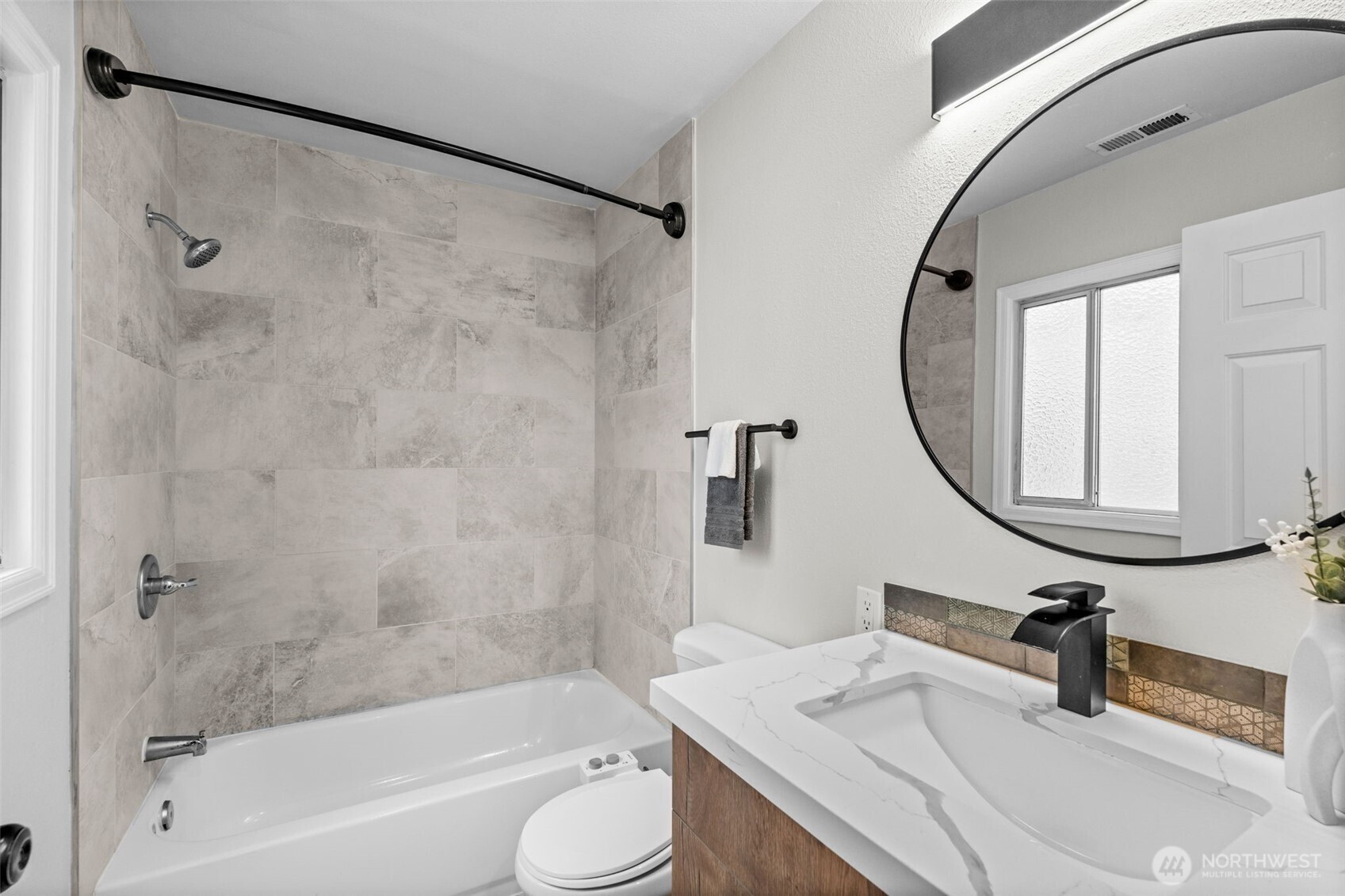 3215 North Tyler Street Tacoma, WA 98407 - Photo 15 of 40 a bathroom with a granite countertop sink toilet and shower