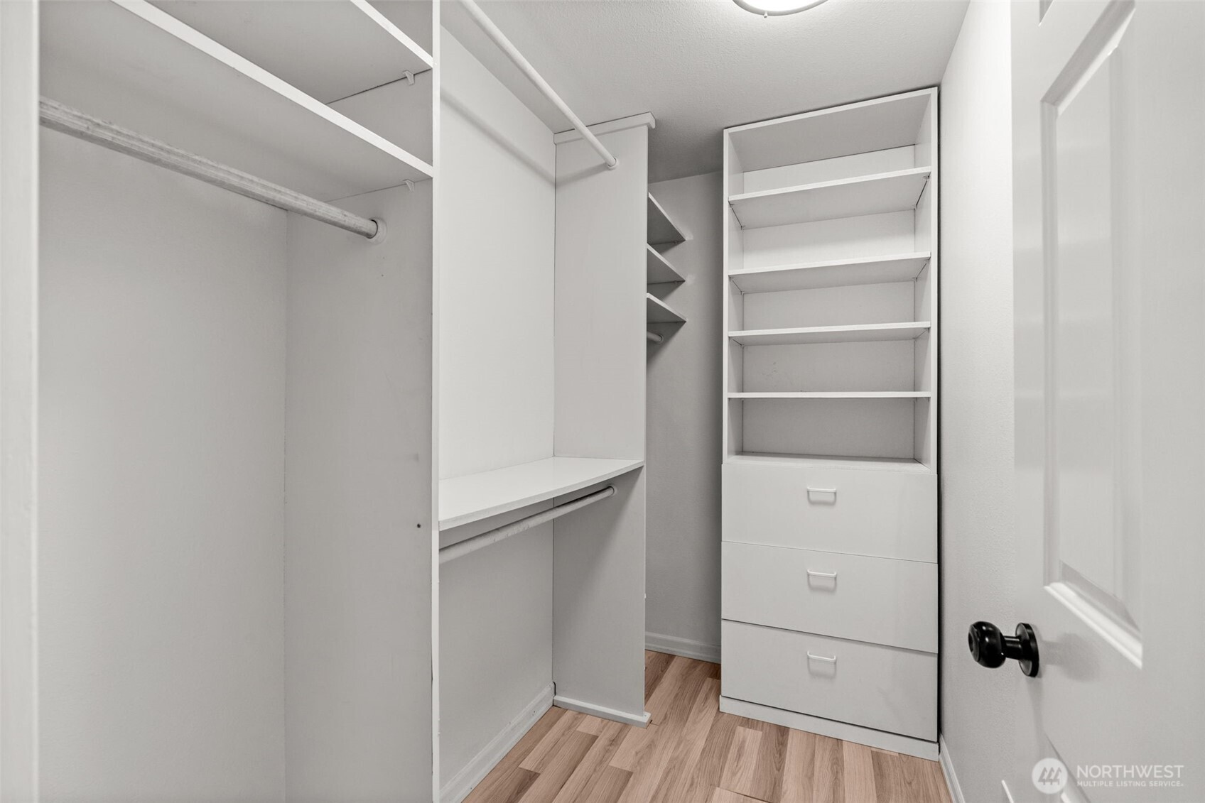 3215 North Tyler Street Tacoma, WA 98407 - Photo 16 of 40 a view of walk in closet with empty racks