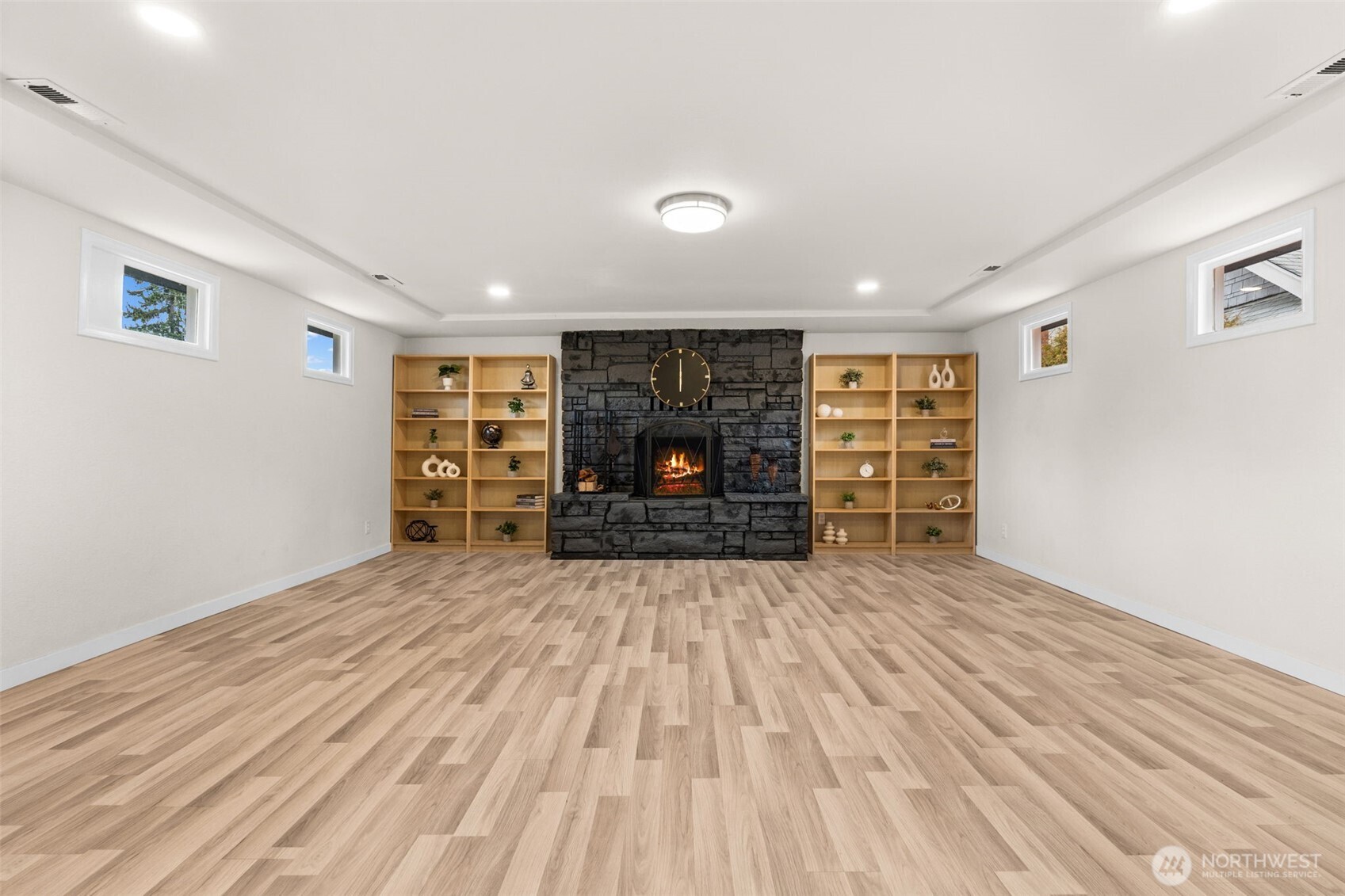 3215 North Tyler Street Tacoma, WA 98407 - Photo 20 of 40 wooden floor in an empty room with a fireplace