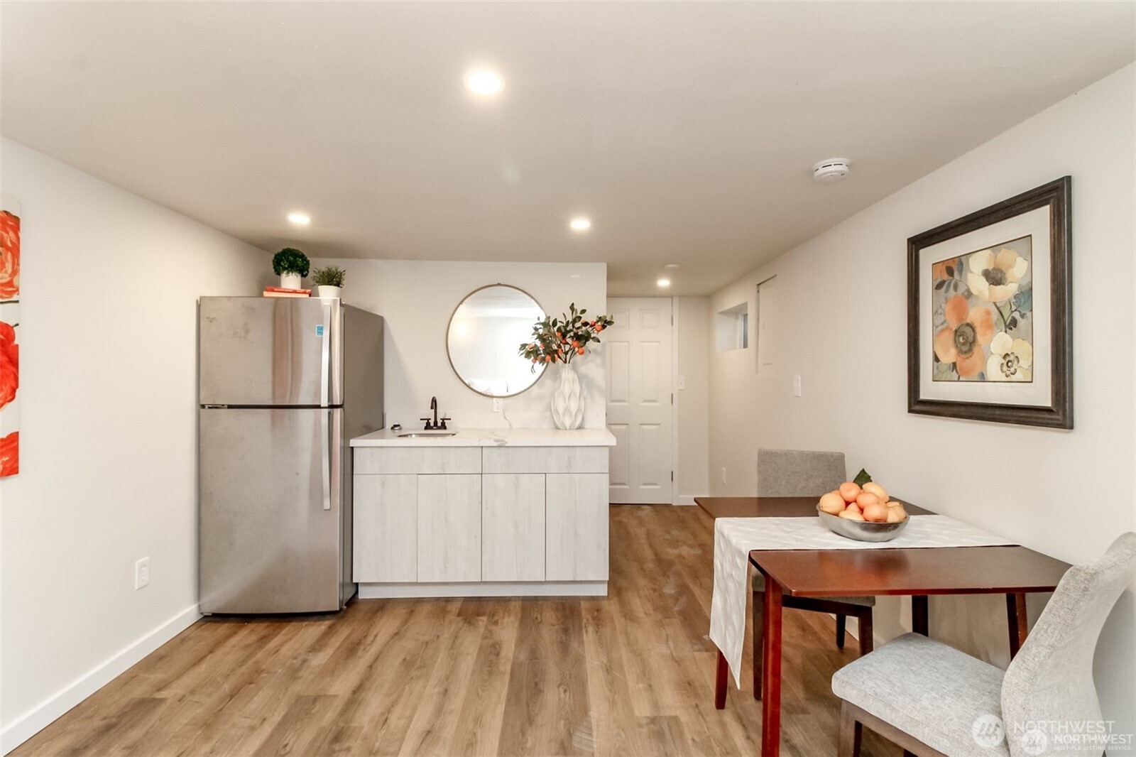 3215 North Tyler Street Tacoma, WA 98407 - Photo 26 of 40 a kitchen with a table and chairs in it