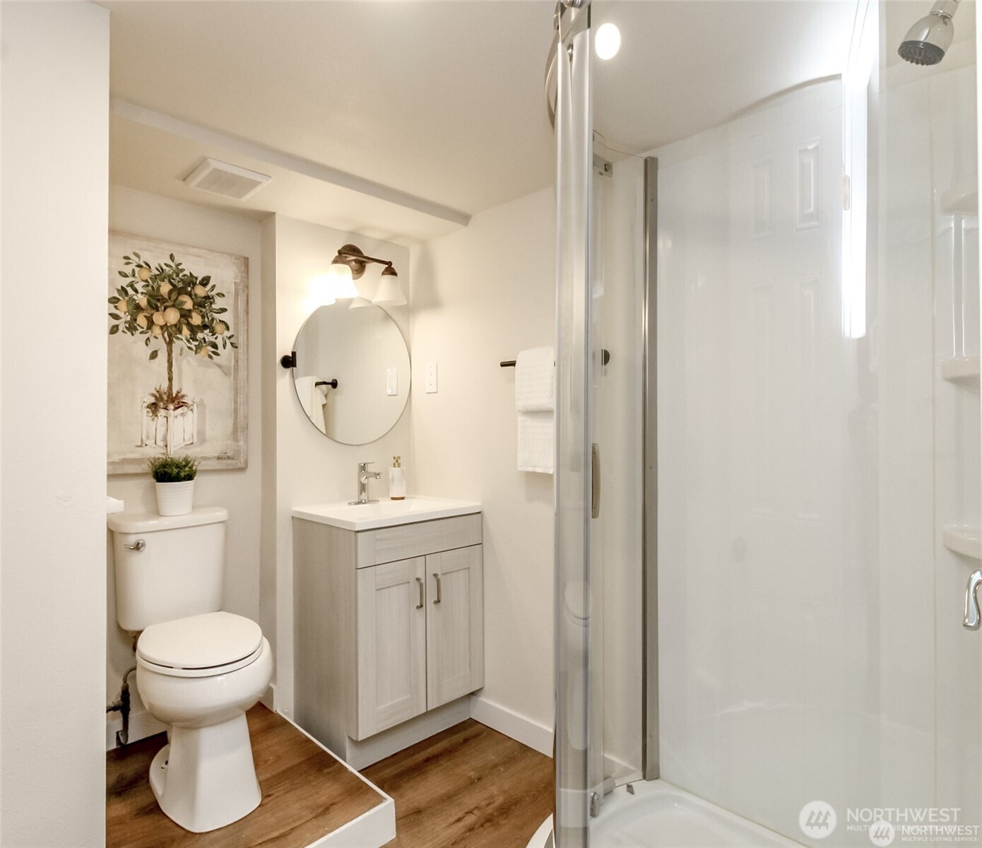 3215 North Tyler Street Tacoma, WA 98407 - Photo 27 of 40 a bathroom with a toilet sink and mirror