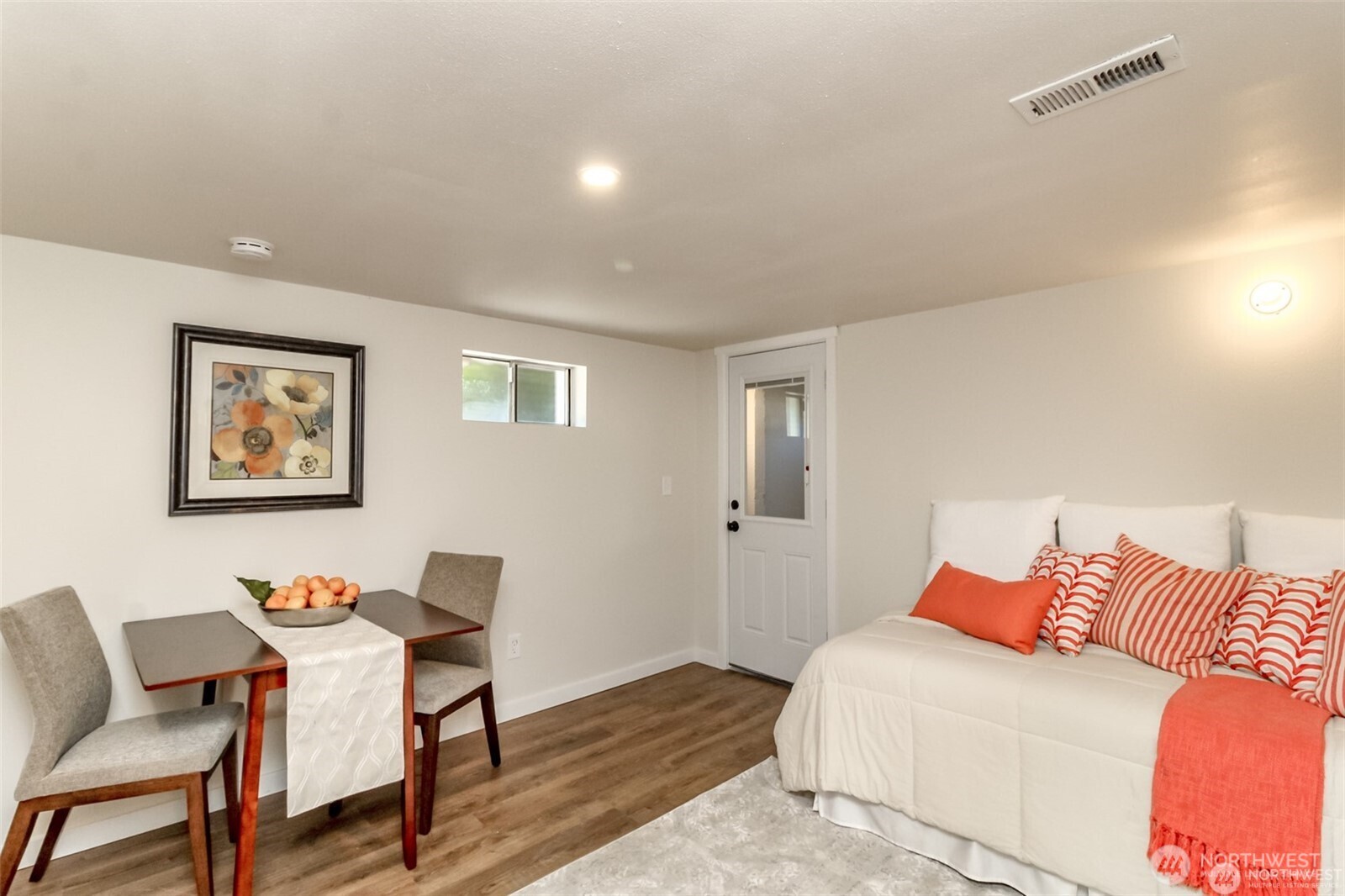 3215 North Tyler Street Tacoma, WA 98407 - Photo 28 of 40 a bedroom with a bed and a chair