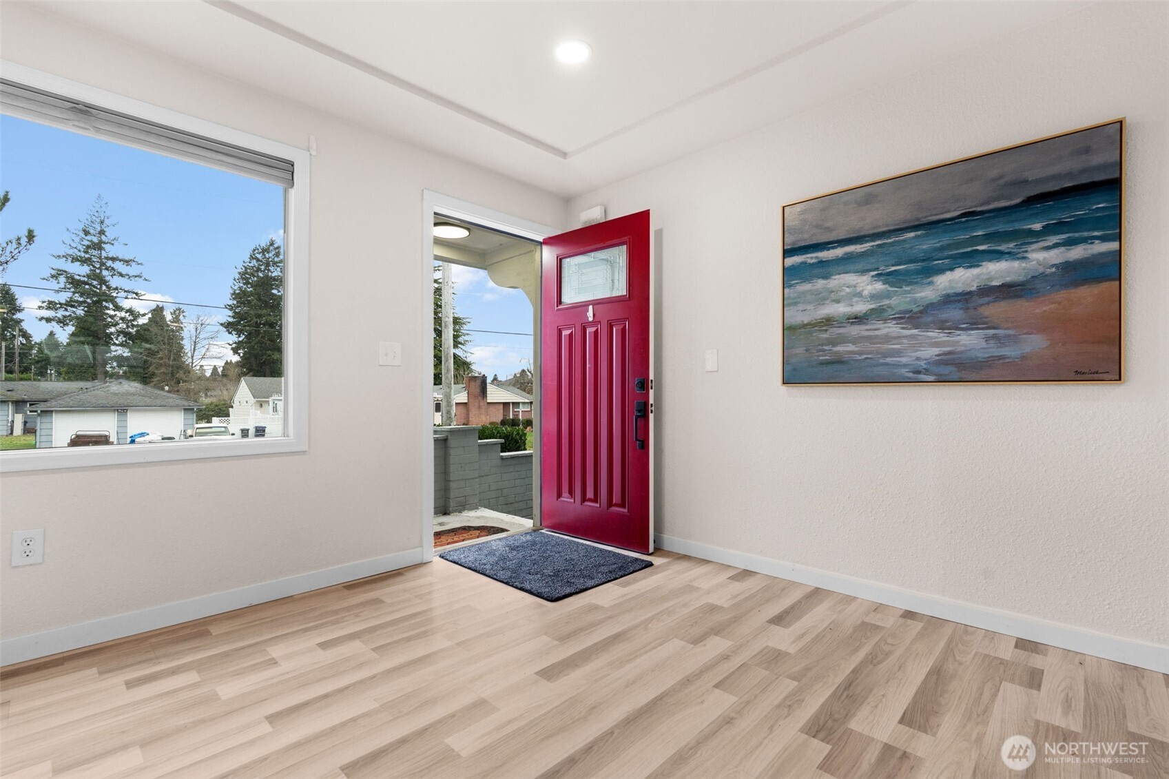 3215 North Tyler Street Tacoma, WA 98407 - Photo 3 of 40 a view of a room with wooden floor and window