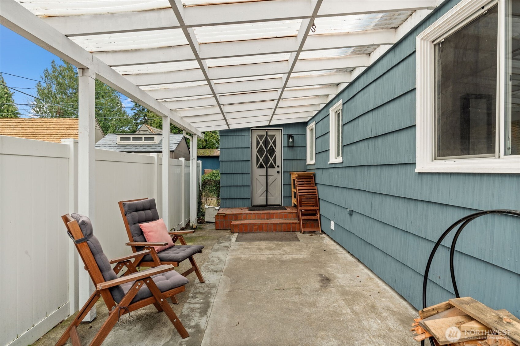3215 North Tyler Street Tacoma, WA 98407 - Photo 31 of 40 a view of a porch with furniture and a yard