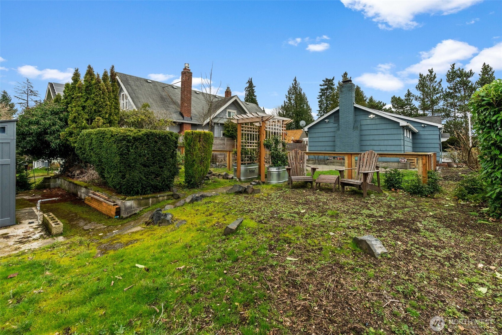 3215 North Tyler Street Tacoma, WA 98407 - Photo 35 of 40 a view of a house with a yard and potted plants