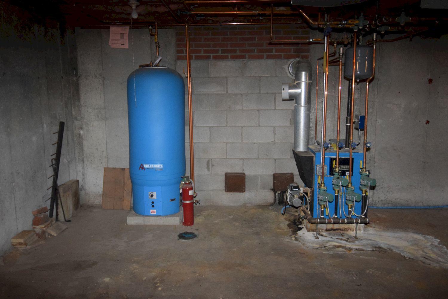 560 Horsetail Hill Road Madison, ME 04950 - Photo 46 of 75 boiler and hot water tank