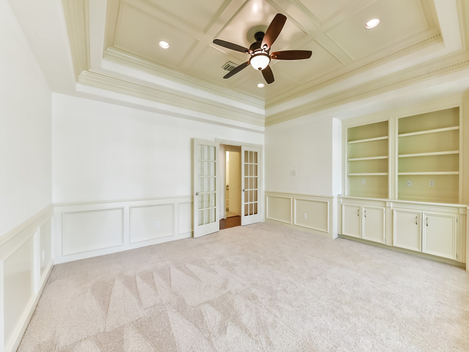 166 East Capstone Circle Spring, TX 77381 - Photo 37 of 45 an empty room with cabinet and ceiling fan