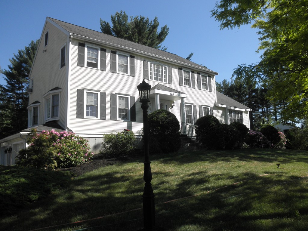 64 Paul Road Hanover, MA 02339 - Photo 1 of 12 a front view of a house with garden and porch