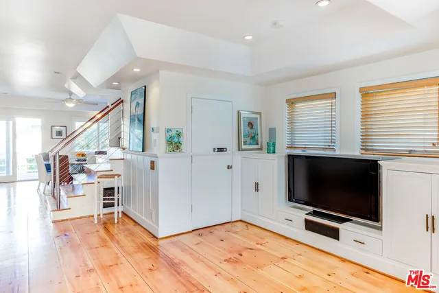 a view of livingroom with furniture and flat screen tv