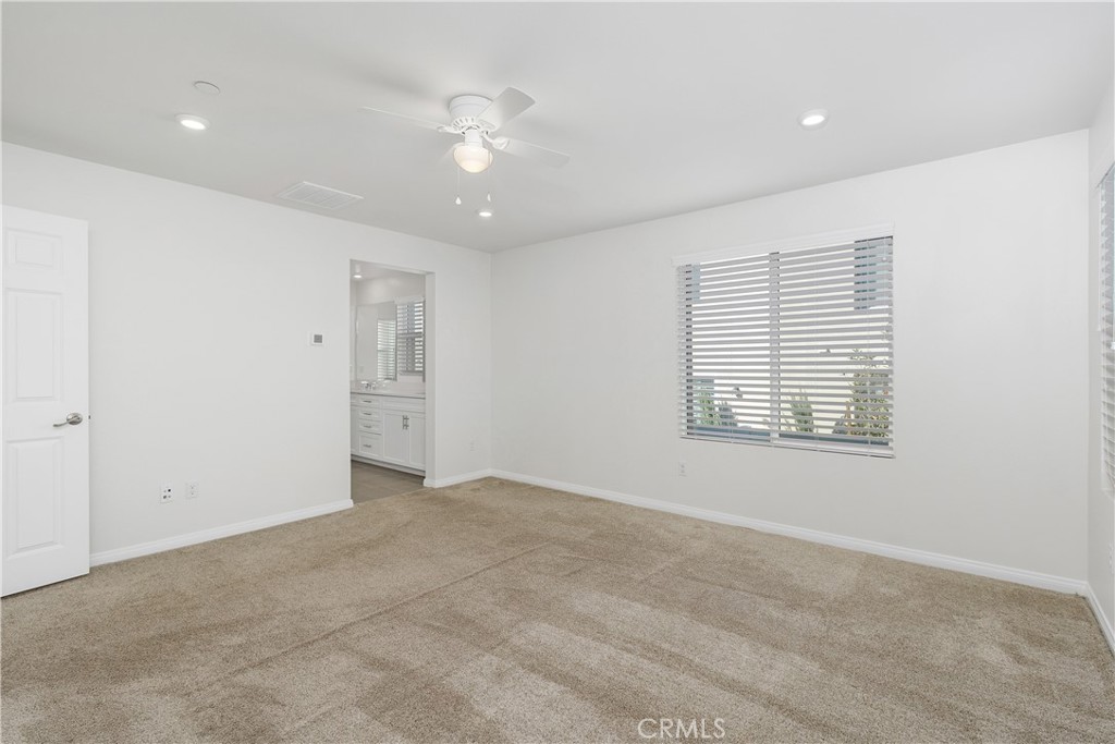 913 Helena Ridge Lake Elsinore, CA 92530 - Photo 21 of 38 a view of an empty room with a window