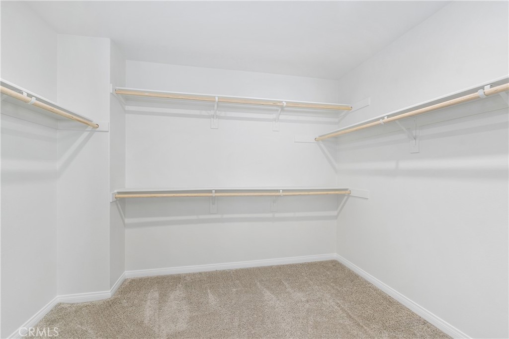 913 Helena Ridge Lake Elsinore, CA 92530 - Photo 26 of 38 a view of an empty walk in closet