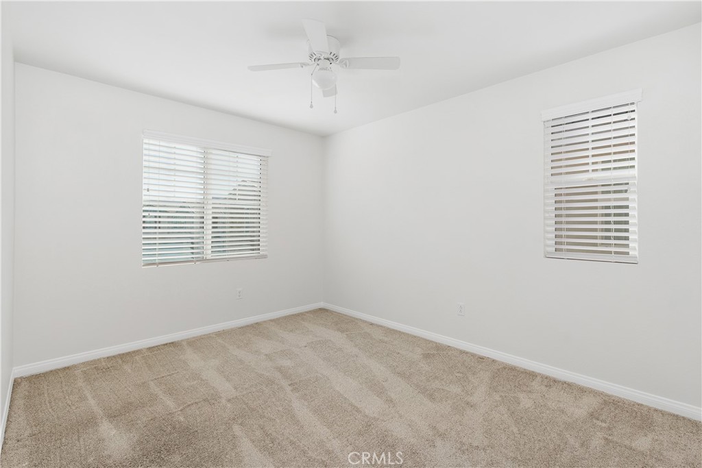 913 Helena Ridge Lake Elsinore, CA 92530 - Photo 27 of 38 an empty room with windows