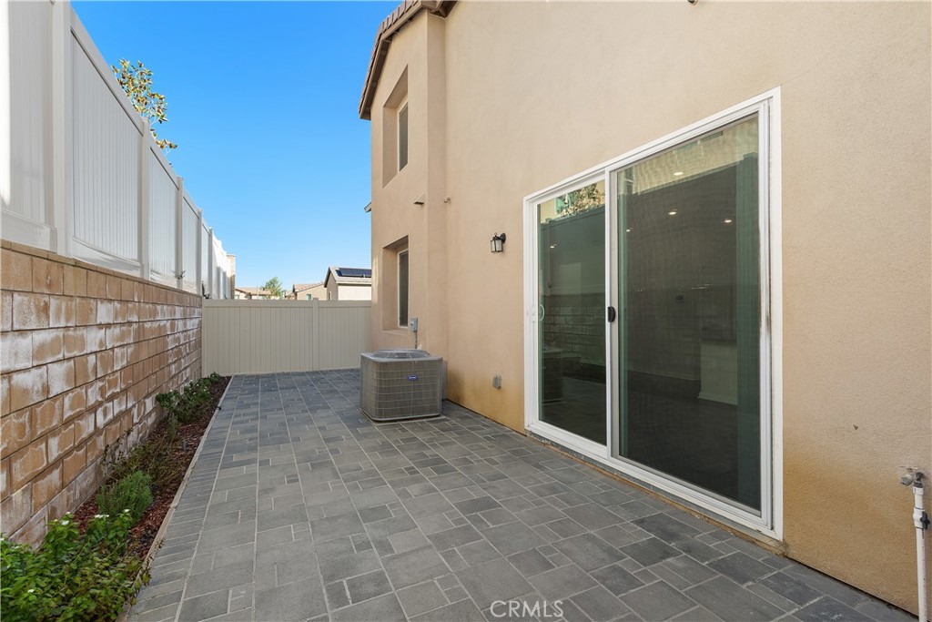 913 Helena Ridge Lake Elsinore, CA 92530 - Photo 31 of 38 a view of a back yard of the house