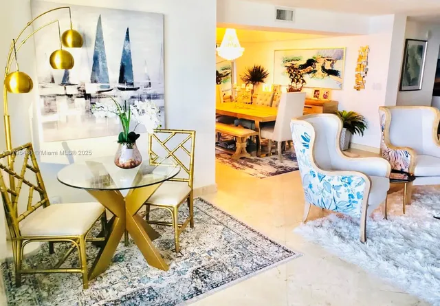 a view of a dining room with furniture