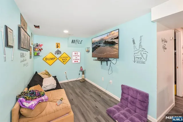 a bedroom with furniture and a bed