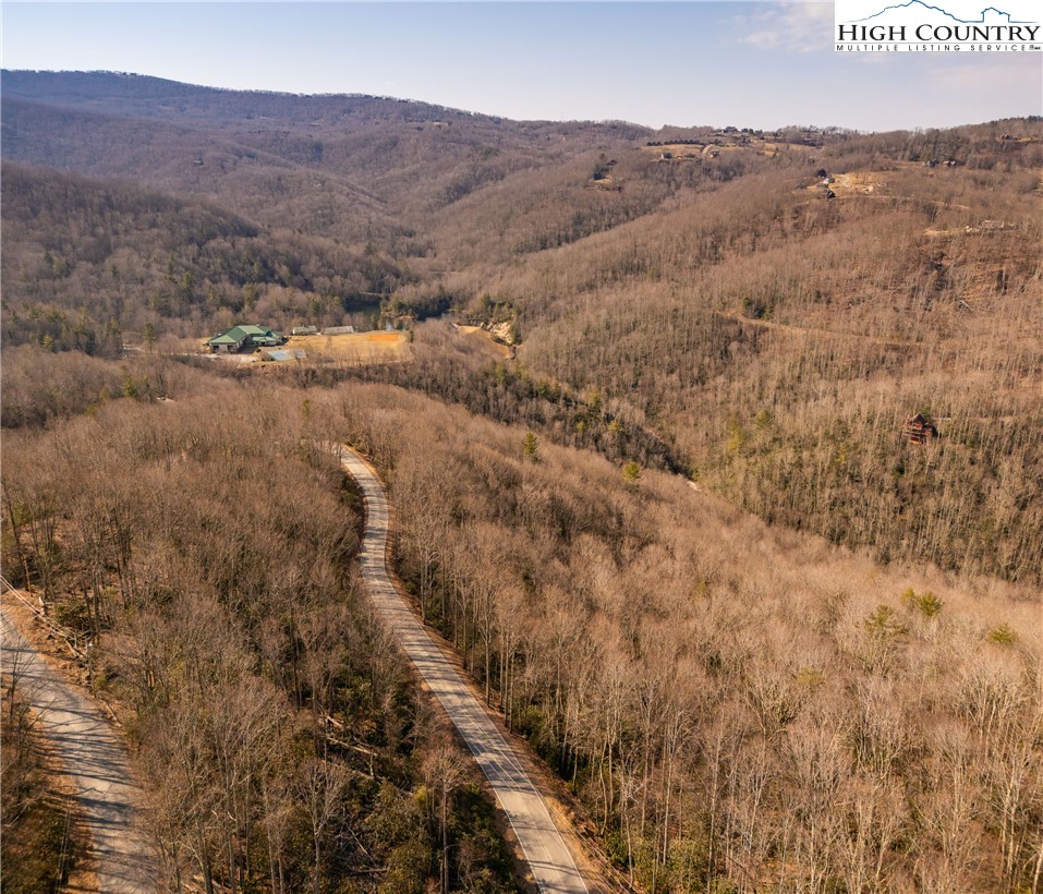 1122 Pine Ridge Road Beech Mountain, NC 28604 - Photo 11 of 38 a view of a mountain in the distance